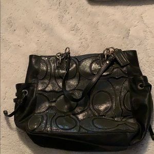 Slightly used coach bag. And coach wallet.